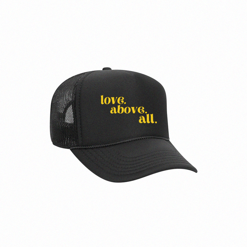 LOVE ABOVE ALL TRUCKER CAP - BLACK